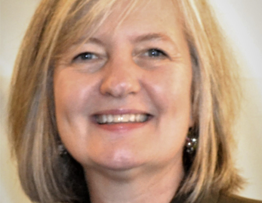 Headshot of Sarah Slocum smiling.