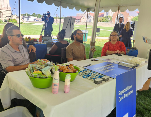 From left to right: MEJI staff Matt Nagaj, Yosué González, and Rachel Richards tabling at the March for Medicaid.