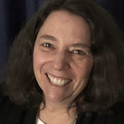 Smiling headshot of Alison Hirschel