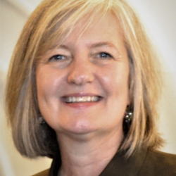 Headshot of Sarah Slocum smiling.